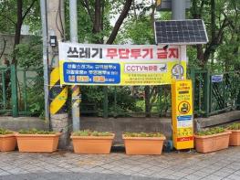 파주시 금촌2동, 불법투기 지역에 꽃길 조성…  이젠 악취 대신 꽃향기기사 이미지